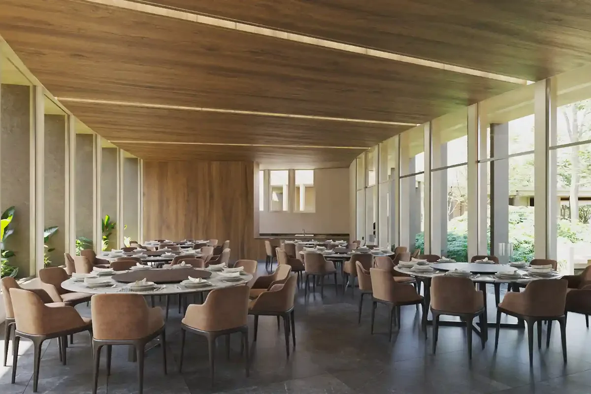 Render del salón de eventos de Nórtico Residencial, de SIMCA Desarrollos, con mesas y ventanales hacia las áreas verdes.
