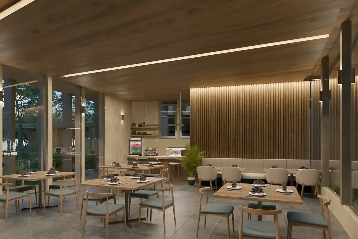 Render del snack bar de Nórtico Residencial, de SIMCA Desarrollos, con mesas y espacios para convivir.